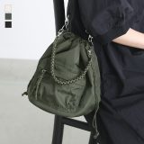 【全品送料無料】ショルダーバッグ 巾着 レディース バッグ 鞄 かばん ミニバッグ 2way 肩掛け 斜め掛け ポシェット 無地 パラコード スポーティー カジュアル シンプル アウトドア 調整可能 ポケット 春 夏 秋 冬【メール便不可】【20】
